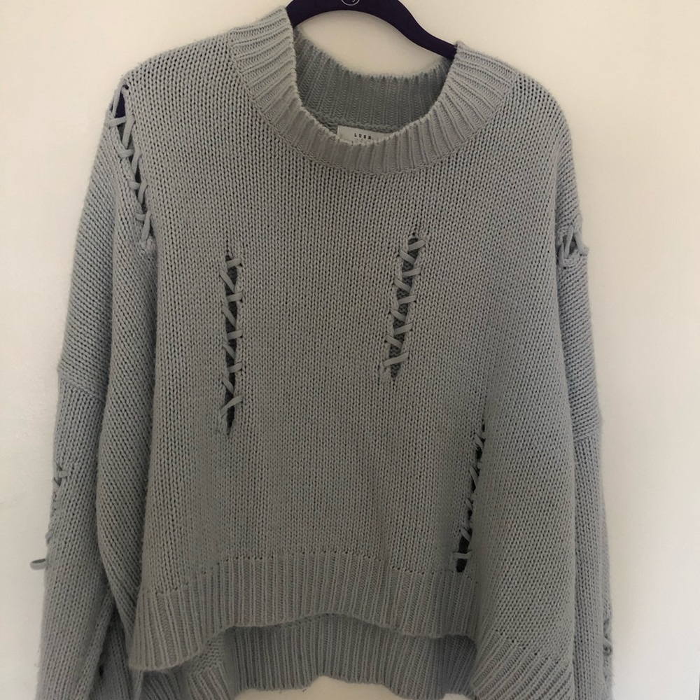 Lush light blue sweater with knit design